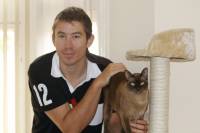 Malcolm and his Burmese feline, Basil Fawlty